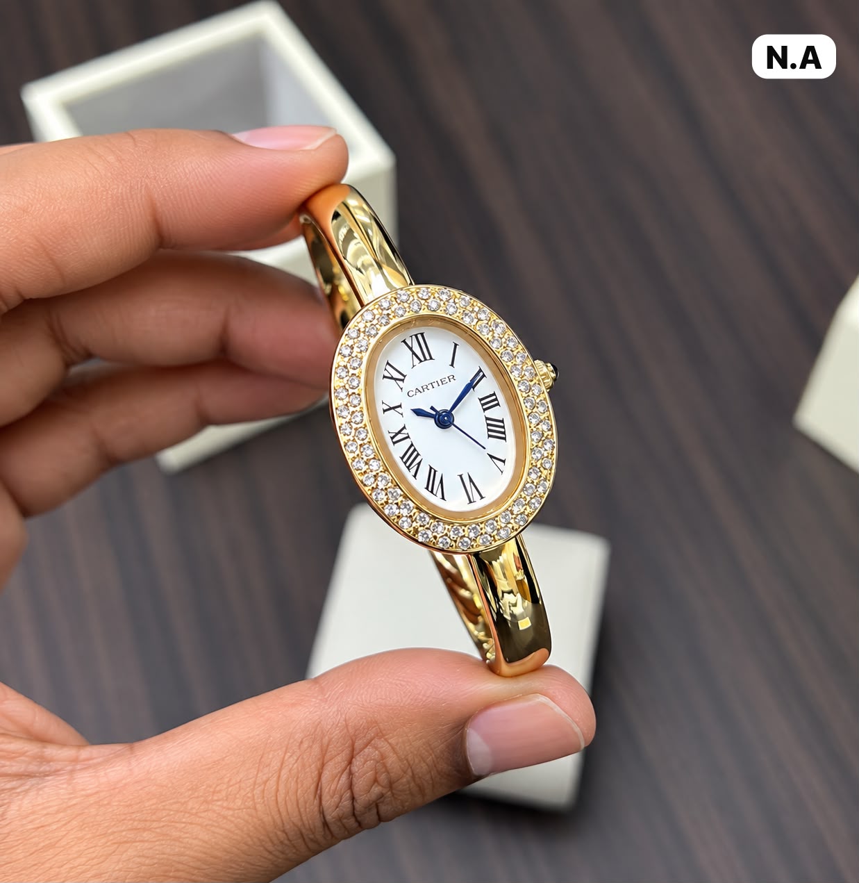 First Copy Cartier Gold Bangle Watch Elegant Oval Dial